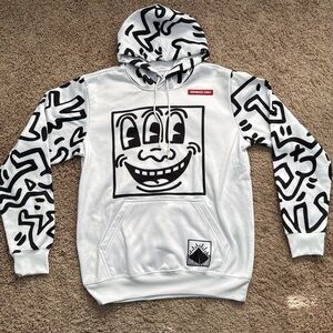 Brand new never worn, white and black hoodie with front pocket!